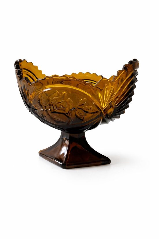 Dzintara krāsas stikla trauks ar rozēm